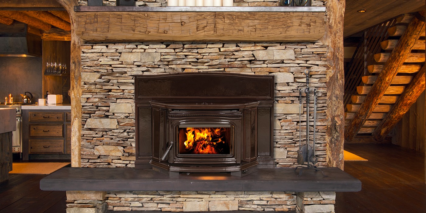 gas fireplace insert with custom surround and wooden mantel
